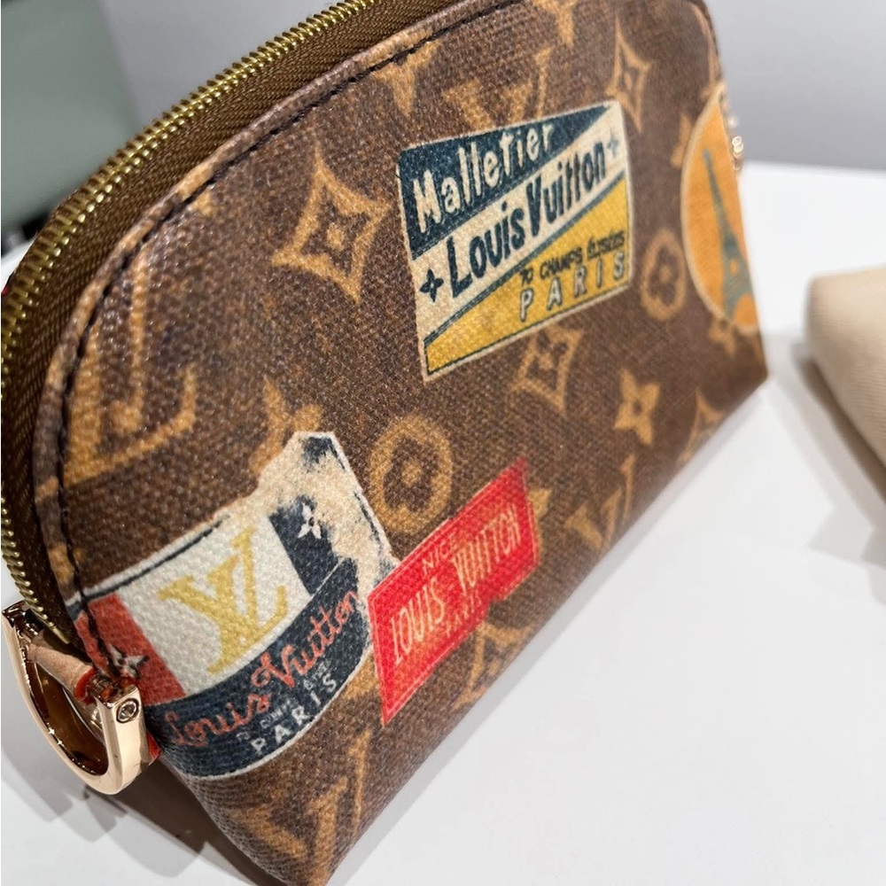 Louis Vuitton Limited edition Pouch with different stamps authentic